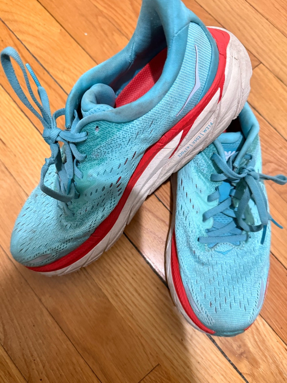 Hoka Women’s Running Shoes in Light Blue with Red Accents size 8